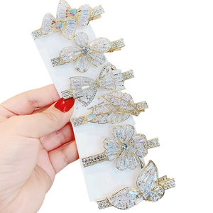 7er Set elegante goldene Haarspangen aus Legierung mit Blatt Blumen und Schleifen Motiven