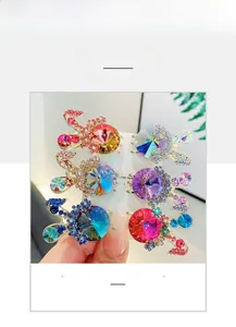 Detailed macro view of bunny shaped hair clips with colorful crystals and sparkling rhinestones