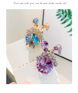 Detailed macro view of cute rabbit-shaped hair clips with sparkling crystal rhinestones