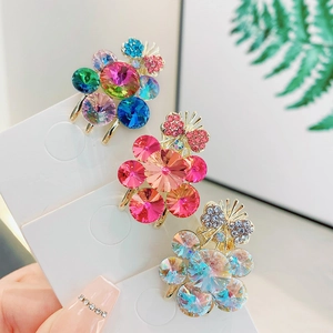 Elegant floral rhinestone hair clips with colorful crystals and gold-tone finish