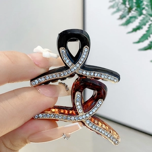Elegant triangle shark hair clip with sparkling rhinestones in black and tortoiseshell