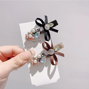 Elegant Korean style ribbon bow hair clips with crystals and pearls on display card