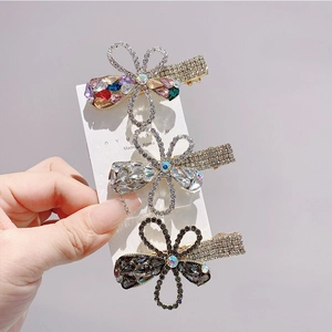 Three elegant French floral hair clips with rhinestones in silver and grey colors