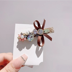 Elegant crystal bow hair clip with brown satin ribbon and pearls for women side styling