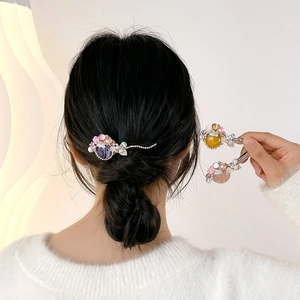 Barrette baroque avec perles, pierres oeil de chat et détails délicats de feuilles