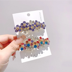 Set di fermagli per capelli con fiori di strass scintillanti e base in lega dorata