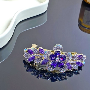 Barrette à fleurs violettes élégante avec finition en alliage doré et strass brillants