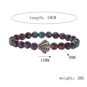 Detailed view of 8mm purple and teal stone beads with 15mm shell charm and 19cm length