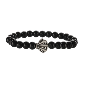 Detailed view of black onyx beaded bracelet featuring a vintage shell-shaped metal charm