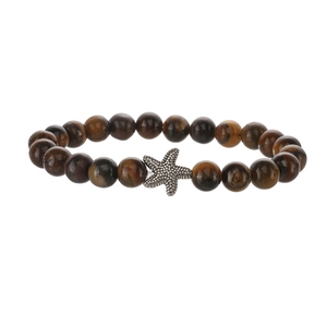 Tiger eye stone bead bracelet with a silver starfish pendant on a white background