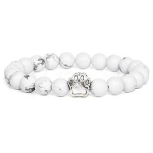 Detail of 10mm white turquoise beaded bracelet featuring a silver dog paw print charm