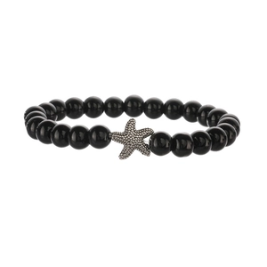 Close-up of handmade black beaded bracelet with a detailed silver starfish charm