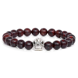 Close-up of 10mm dark red stone beads bracelet with a vintage silver paw print charm