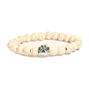 Howlite beaded bracelet with 10mm stones and a silver metal dog paw charm centerpiece