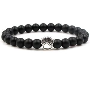 Black matte 10mm lava stone bead bracelet featuring a silver dog paw print charm for men