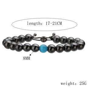 Detail view of 8mm beaded bracelet with blue stone and adjustable cord for 17-21cm wrist
