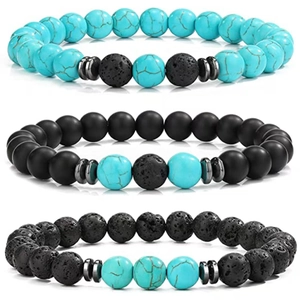 Detailed macro view of three beaded bracelets with turquoise, lava rock, and matte beads