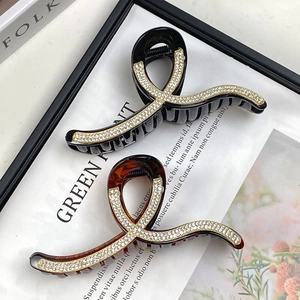 Set of two large geometric hair claws with rhinestones in black and tortoiseshell finish