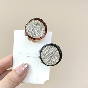 Pinces à cheveux rondes avec strass brillants en noir et écaille de tortue pour femme