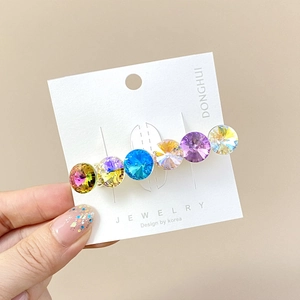 Elegant Korean style hair clip with six colorful large K9 crystals on a display card