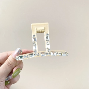 Minimalist beige rectangular crystal hair claw clip with rhinestones for elegant updos