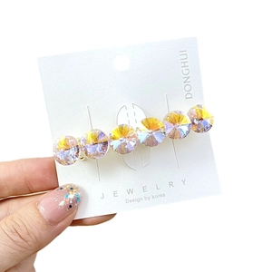 Elegant Korean style gold hair clip featuring six iridescent K9 crystals on white card