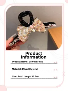Detail view of 12.8cm bow hair claw clip with pink rhinestones and pearls