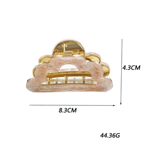 Detailed view of French cloud hair claw clip with marble texture and dimensions 8.3cm
