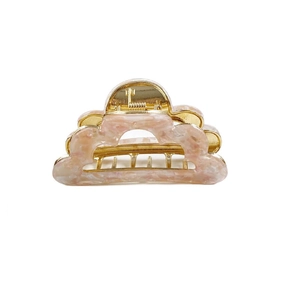 Pink marble cloud hair claw clip with golden metal frame for elegant women's styling