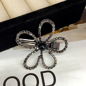 Fashion alloy hair clip featuring five-petal flower with grey rhinestones and black bead