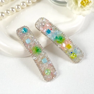 Elegant pair of crystal-beaded rectangular hair clips with pastel floral and gemstone accents