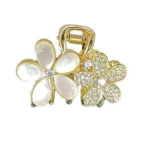 Elegant gold flower hair claw clip with cat eye stones, pearls and sparkling rhinestones