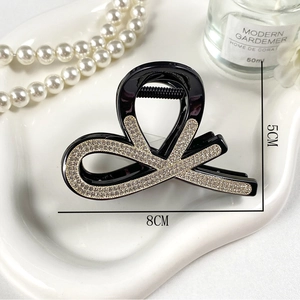 Elegante pinza per capelli da 8cm in resina nera con strass scintillanti da donna