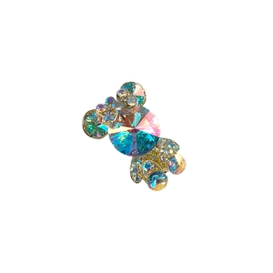 Barrette à cheveux dorée ornée d'un grand cristal K9 iridescent et de strass brillants