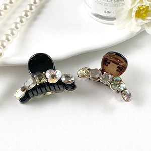Elegant French style hair claw clips with crystals and pearl flowers in black and amber