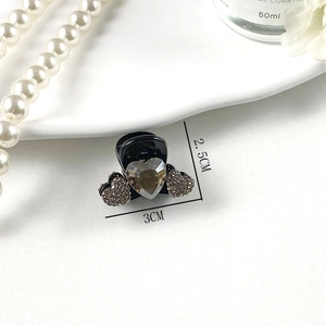 Close-up of sparkling heart rhinestone hair clip with 2.5cm and 3cm size measurements