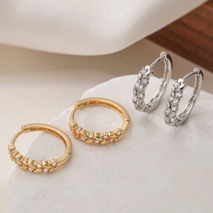Luxurious 18K gold and silver wheat pattern hoop earrings with sparkling zircons
