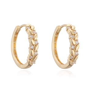 Detailed view of 18K gold plated wheat ear huggie earrings with marquise zircon stones