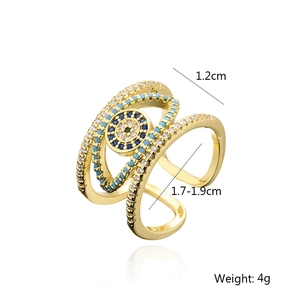 Macro shot of gold-plated evil eye ring showing dimensions 1.2cm and 4g weight