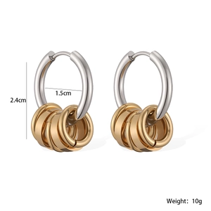 Detailed view of two-tone 18K gold plated stainless steel hoops with dimensions and weight