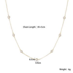 Detail view of 18K gold plated necklace with 7 bezel-set zircons and size specifications