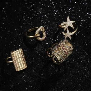 Chic gold geometric open rings set with sparkling zircon and bohemian celestial motifs