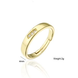 Minimalistischer 18K vergoldeter Kupferring mit drei runden Zirkonia und offenem Design