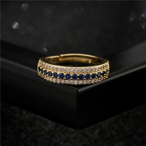 Three-row pavé cubic zirconia adjustable gold ring with blue and white stones