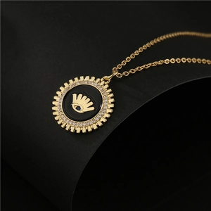 Collana con pendente occhio greco dorato con pavé di zirconi bianchi e smalto nero