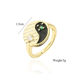 Detail view of adjustable Yin Yang ring with white zircon and green stone inlay, 1.5cm diameter