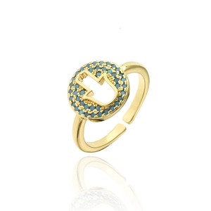 Golden Hamsa hand open ring featuring turquoise stones and an adjustable geometric band