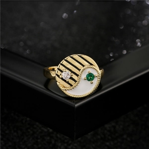 Fashionable Yin Yang gold-plated copper ring with zircon and green gemstone insets