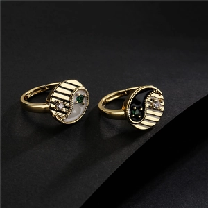 Yin Yang adjustable open ring set in gold copper with black white enamel and zircon