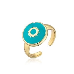 Detail of 18K gold-plated ring with turquoise enamel inlay and golden sun pattern
